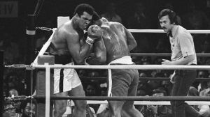 Muhammad Ali and Smoking Joe Frazier fight in the Thrilla in Manila